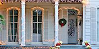 A New Orleans porch decorated with Christmas decorations 