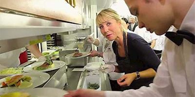 Karine Hagen in the kitchen with Viking Chefs working the line.