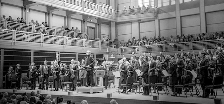 The Santa Rosa Symphony standing after a performance